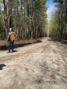 Guide standing on heritage historic trail.